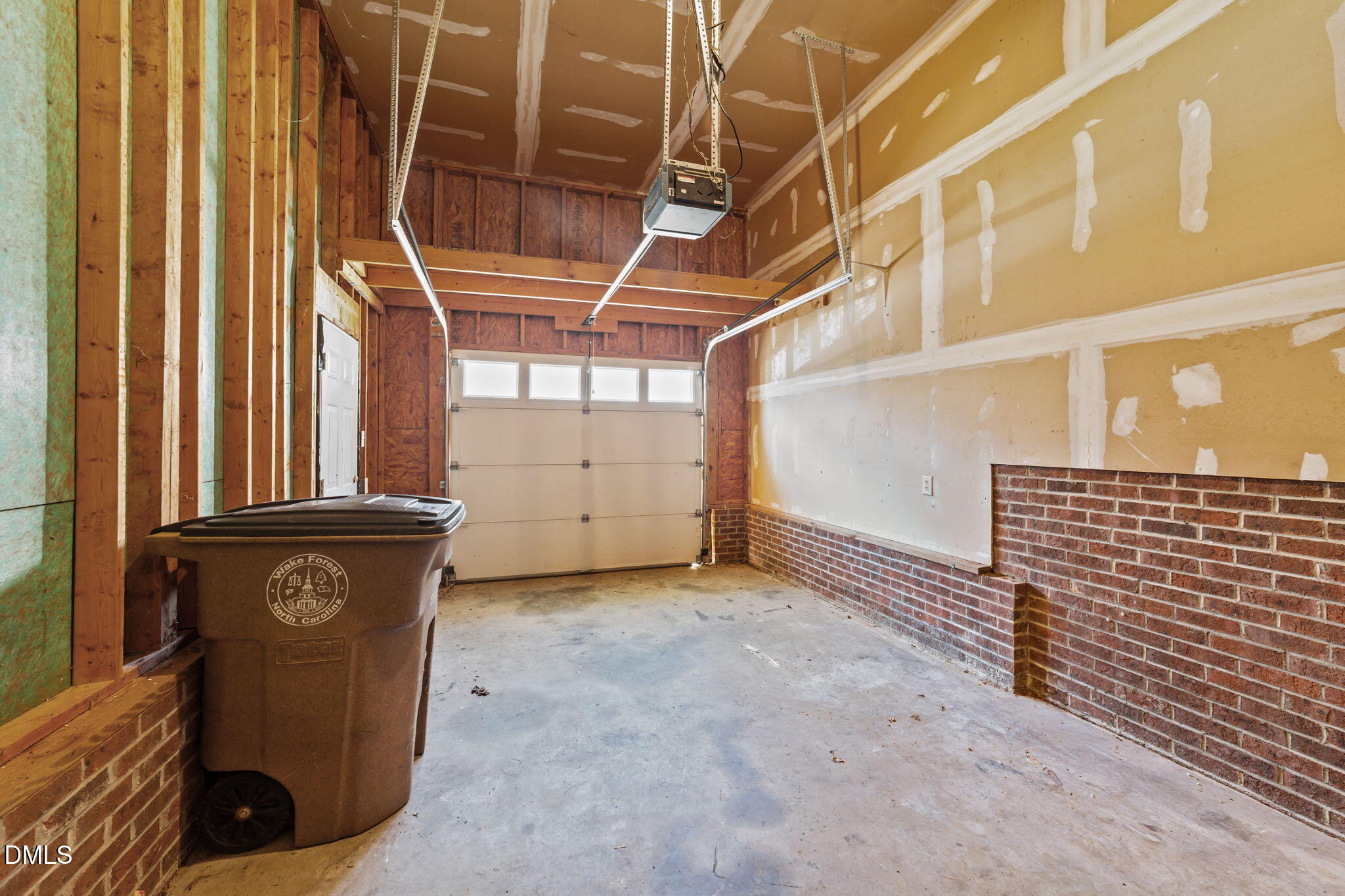 624 Harris Point Way Wake Forest, NC 27587 - Photo 31 of 38 a view of a livingroom with wooden floor and windows