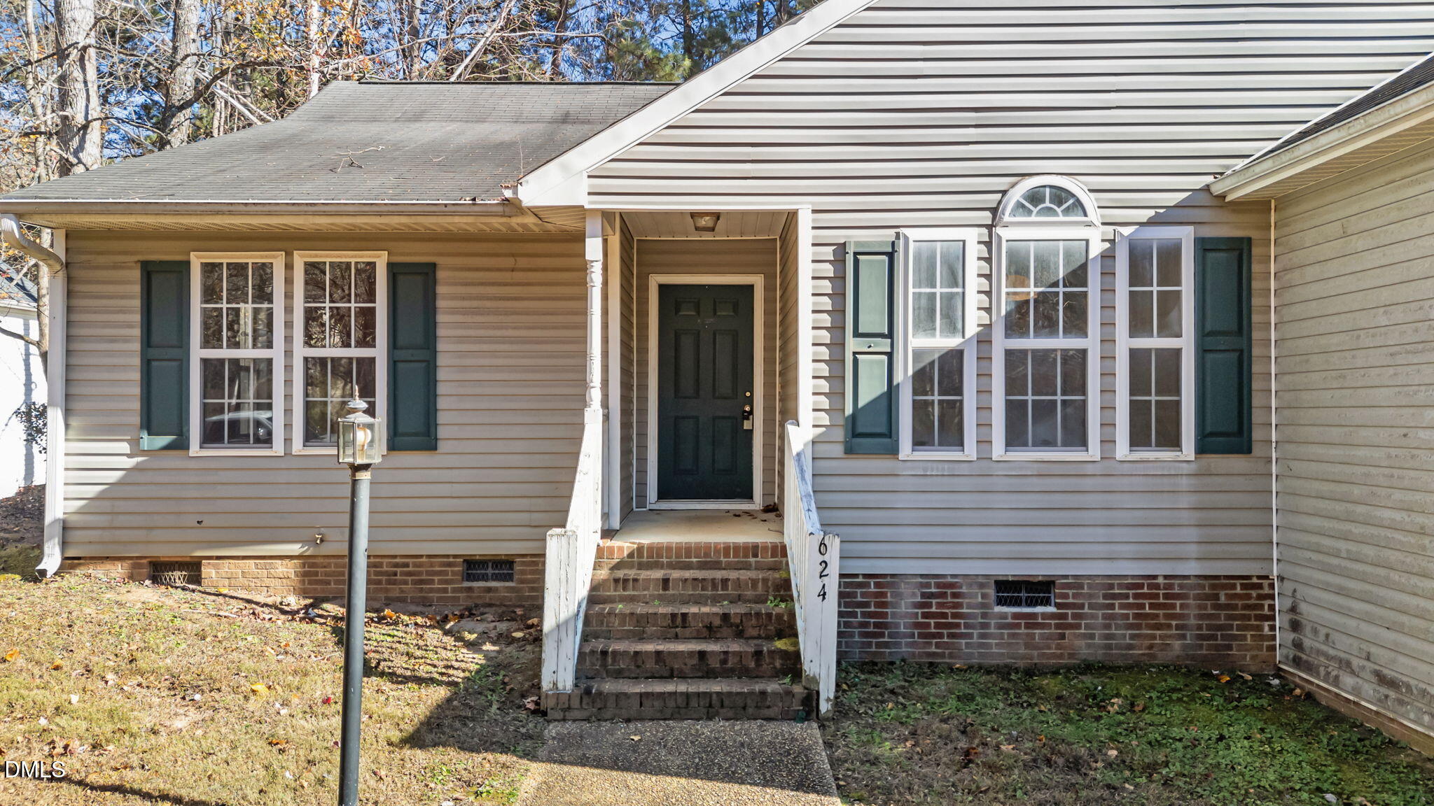624 Harris Point Way Wake Forest, NC 27587 - Photo 4 of 38 a view of a house with wooden fence
