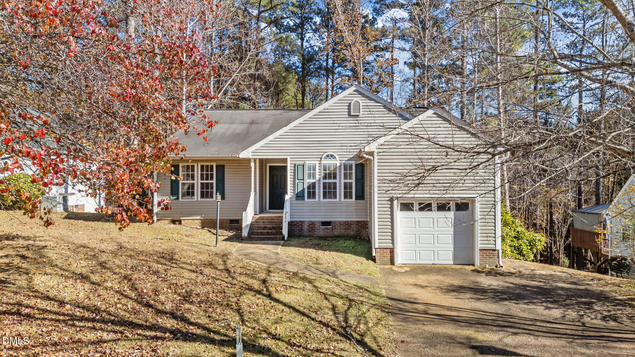 624 Harris Point Way Wake Forest, NC 27587 - Photo 5 of 38 a front view of a house with a yard covered in snow