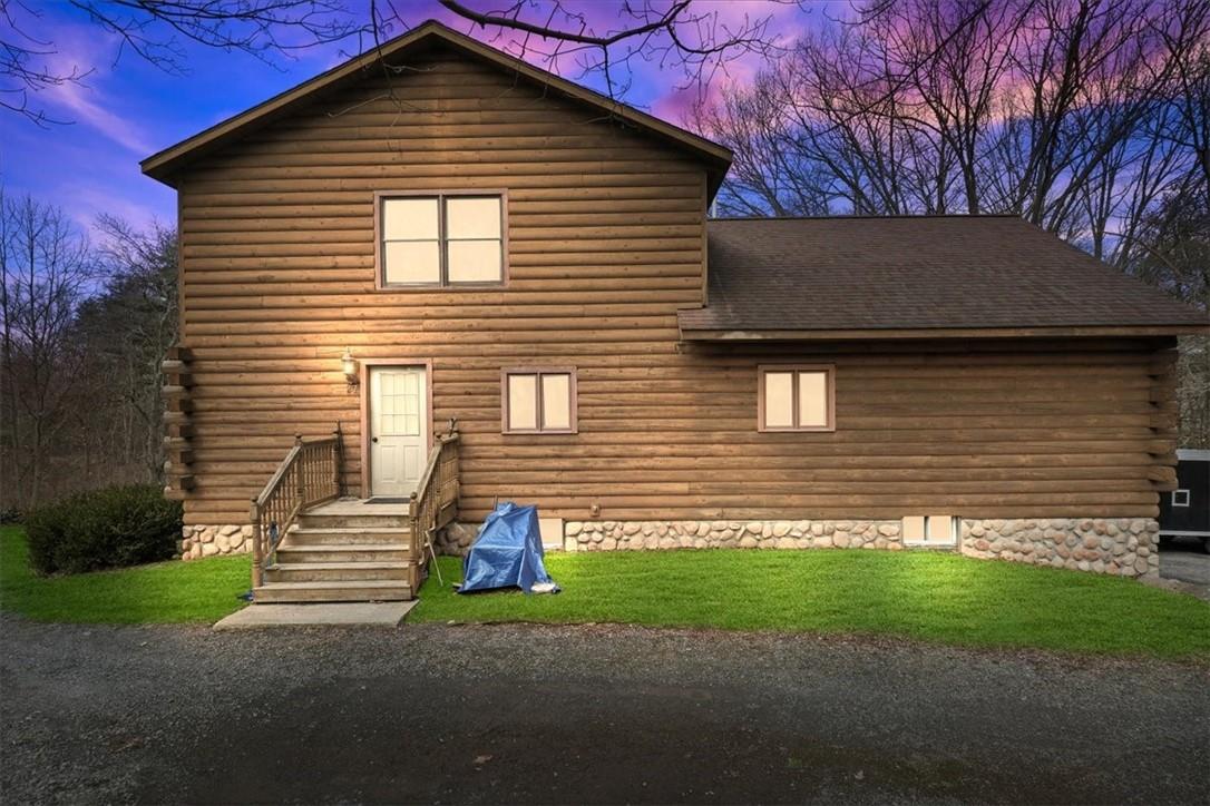 27 Ose Road Highland, NY 12528 - Photo 1 of 1 a front view of a house with a yard