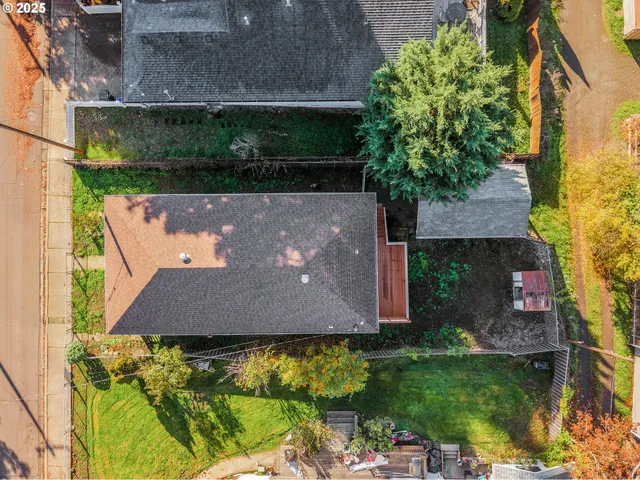 a view of house with yard and seating space