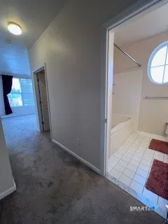 a bathroom with a sink a toilet and a bathtub