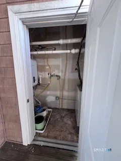 a room with gym equipment and a large window