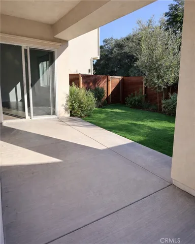 a view of backyard with green space