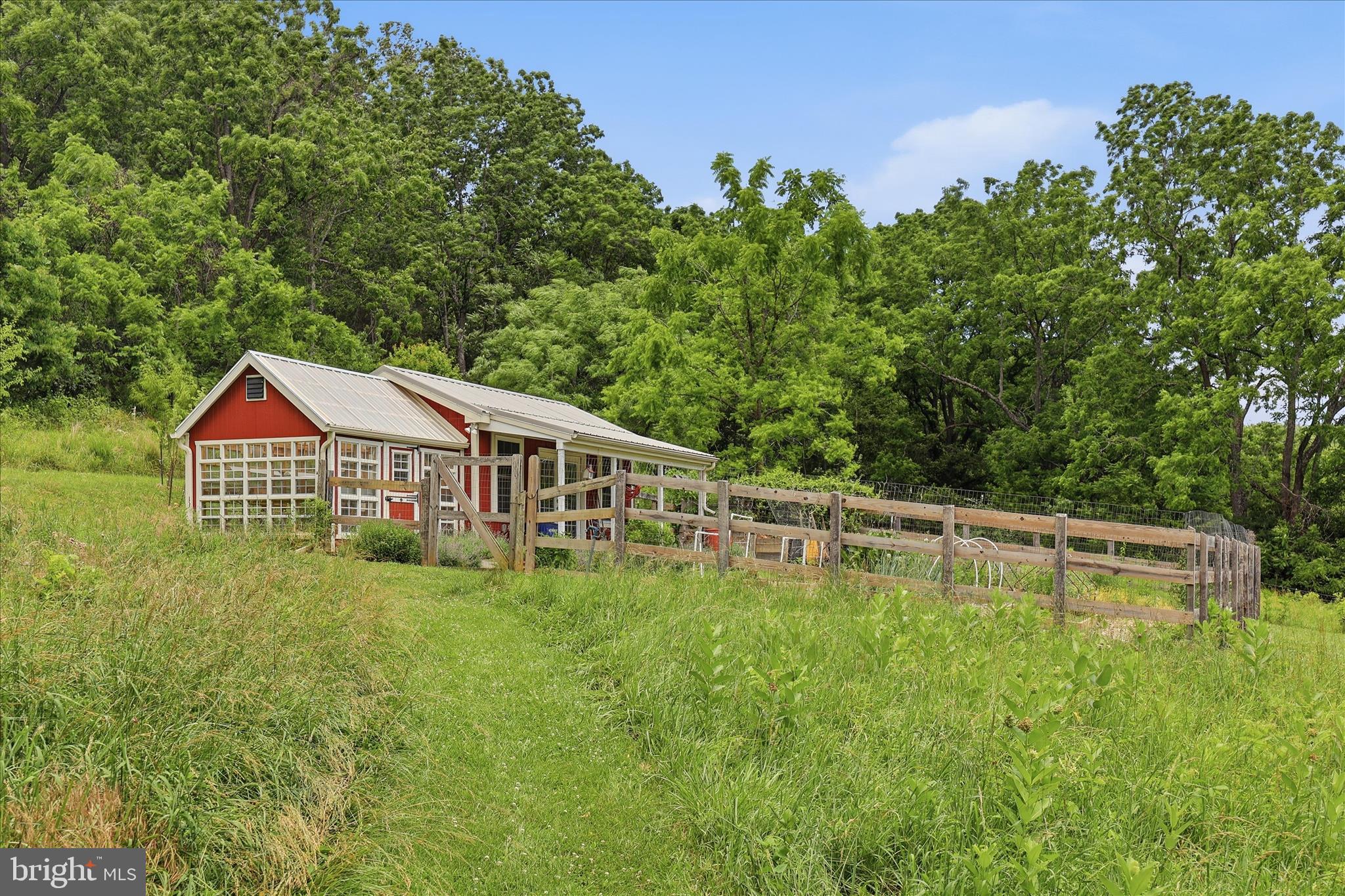 10919 Etzler Mill Road Woodsboro, MD 21798 - Photo 47 of 54 a view of a house with a yard and sitting area