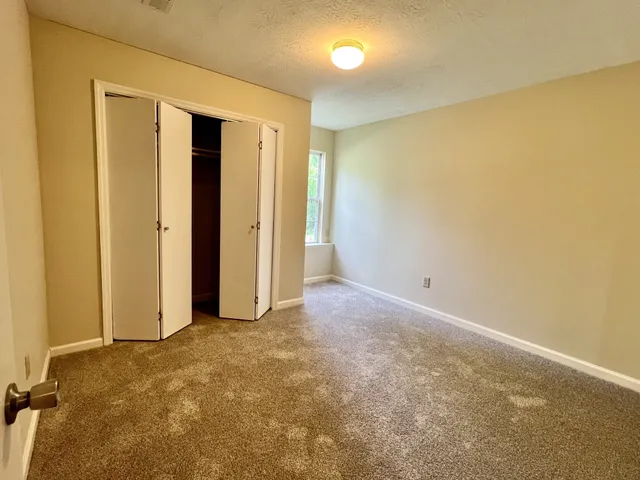 an empty room with a natural light