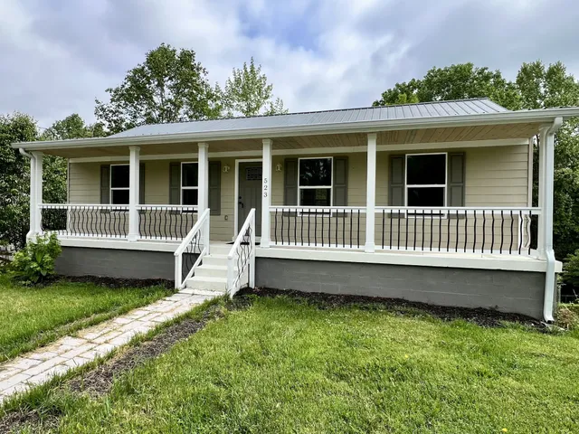 a view of a house with a roof deck