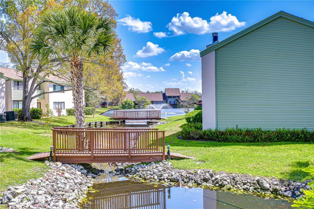 13402 Pinelake Way, Unit 202B Tampa, FL 33618 - Photo 41 of 42 a front view of a house with garden