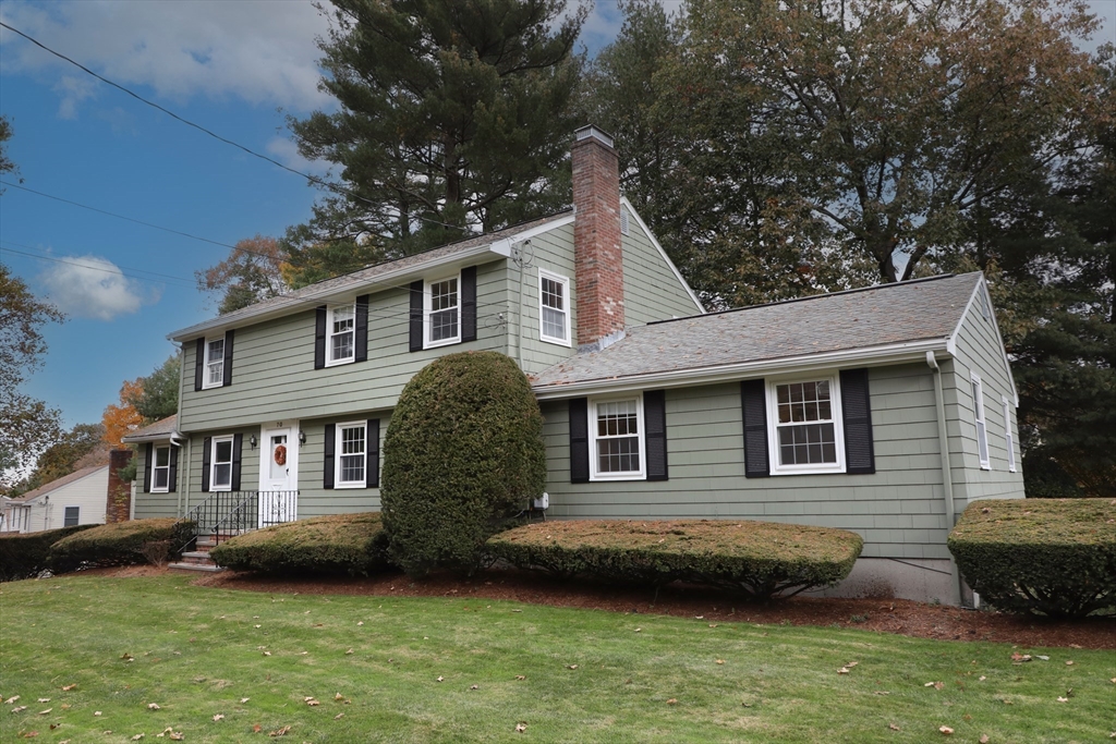 70 Old Nahant Road Wakefield, MA 01880 - Photo 2 of 42 a view of a house with a garden and a tree
