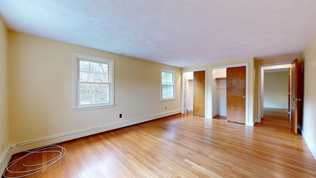 70 Old Nahant Road Wakefield, MA 01880 - Photo 24 of 42 a view of an empty room with wooden floor and a window