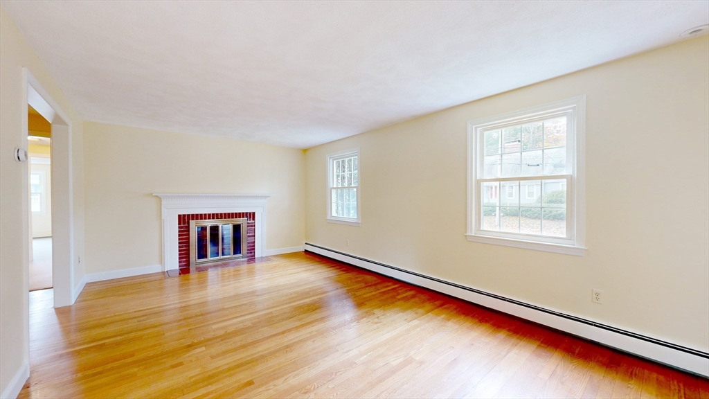 70 Old Nahant Road Wakefield, MA 01880 - Photo 7 of 42 a view of an empty room with window and wooden floor