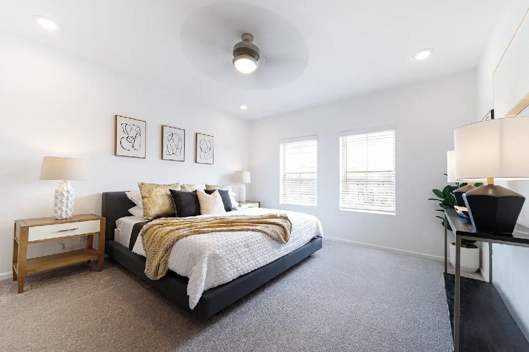 9730 Kilkenny Street Rosharon, TX 77583 - Photo 12 of 14 a spacious bedroom with a bed and a window