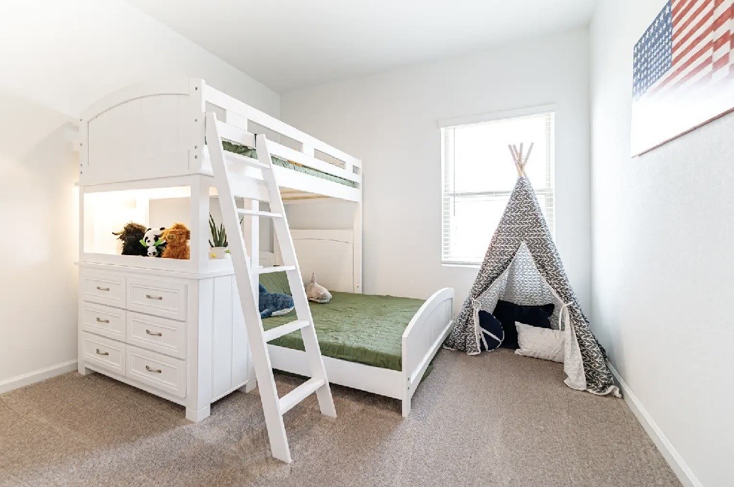 9730 Kilkenny Street Rosharon, TX 77583 - Photo 13 of 14 a bed room with a bed and a window