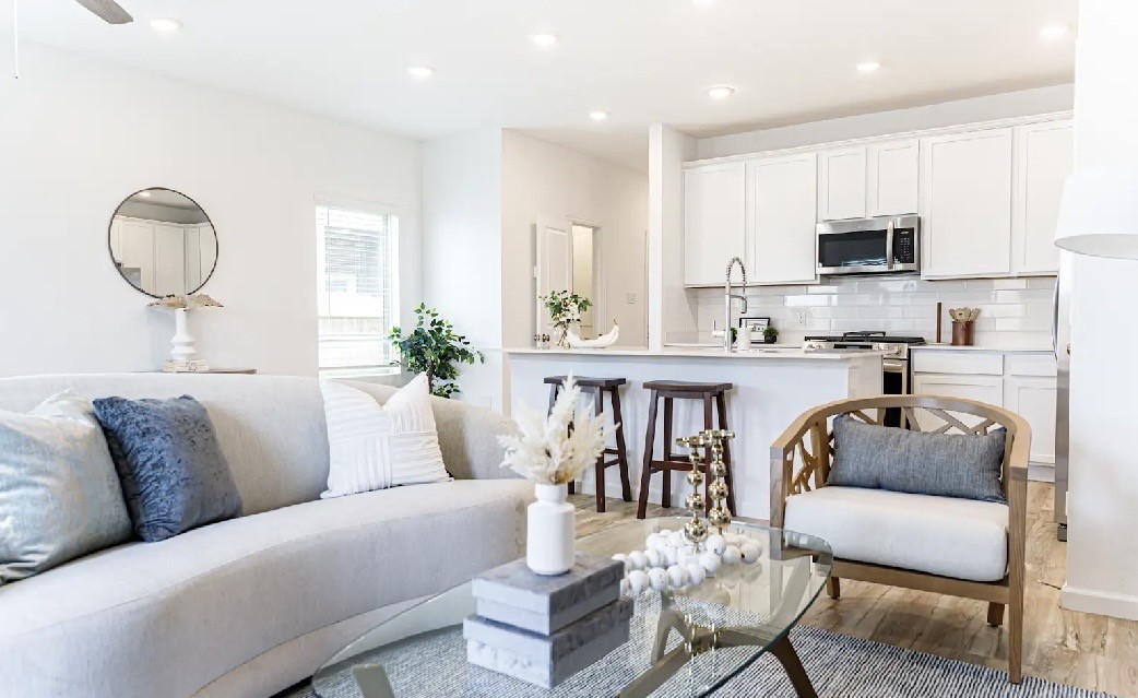 9730 Kilkenny Street Rosharon, TX 77583 - Photo 9 of 14 a living room with furniture kitchen view and a window
