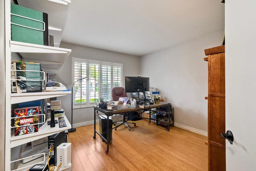 1208 Sunglow Drive Oceanside, CA 92056 - Photo 15 of 20 a view of a workspace with furniture and a window