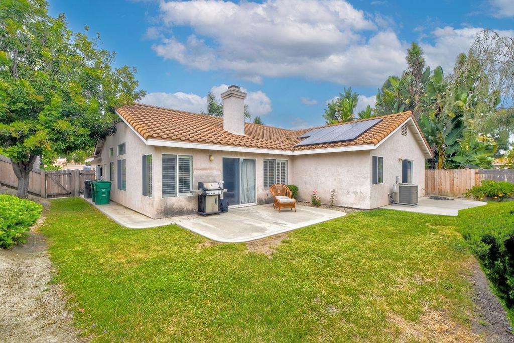 1208 Sunglow Drive Oceanside, CA 92056 - Photo 17 of 20 a front view of house with yard and patio