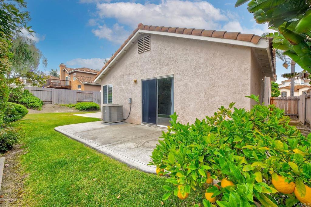 1208 Sunglow Drive Oceanside, CA 92056 - Photo 19 of 20 a view of a house with a yard and plants