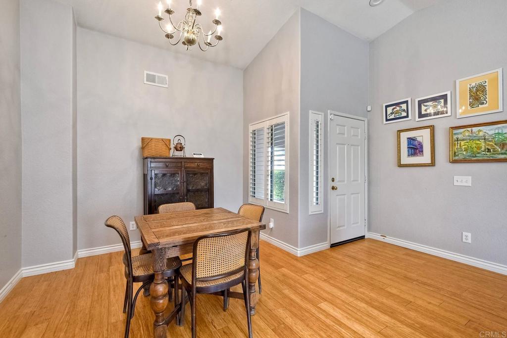 1208 Sunglow Drive Oceanside, CA 92056 - Photo 2 of 20 a dining room with furniture and chandelier