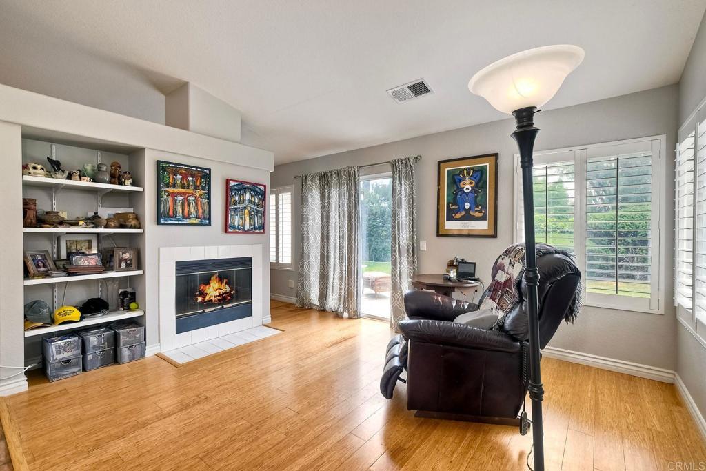 1208 Sunglow Drive Oceanside, CA 92056 - Photo 6 of 20 a living room with furniture and a fireplace