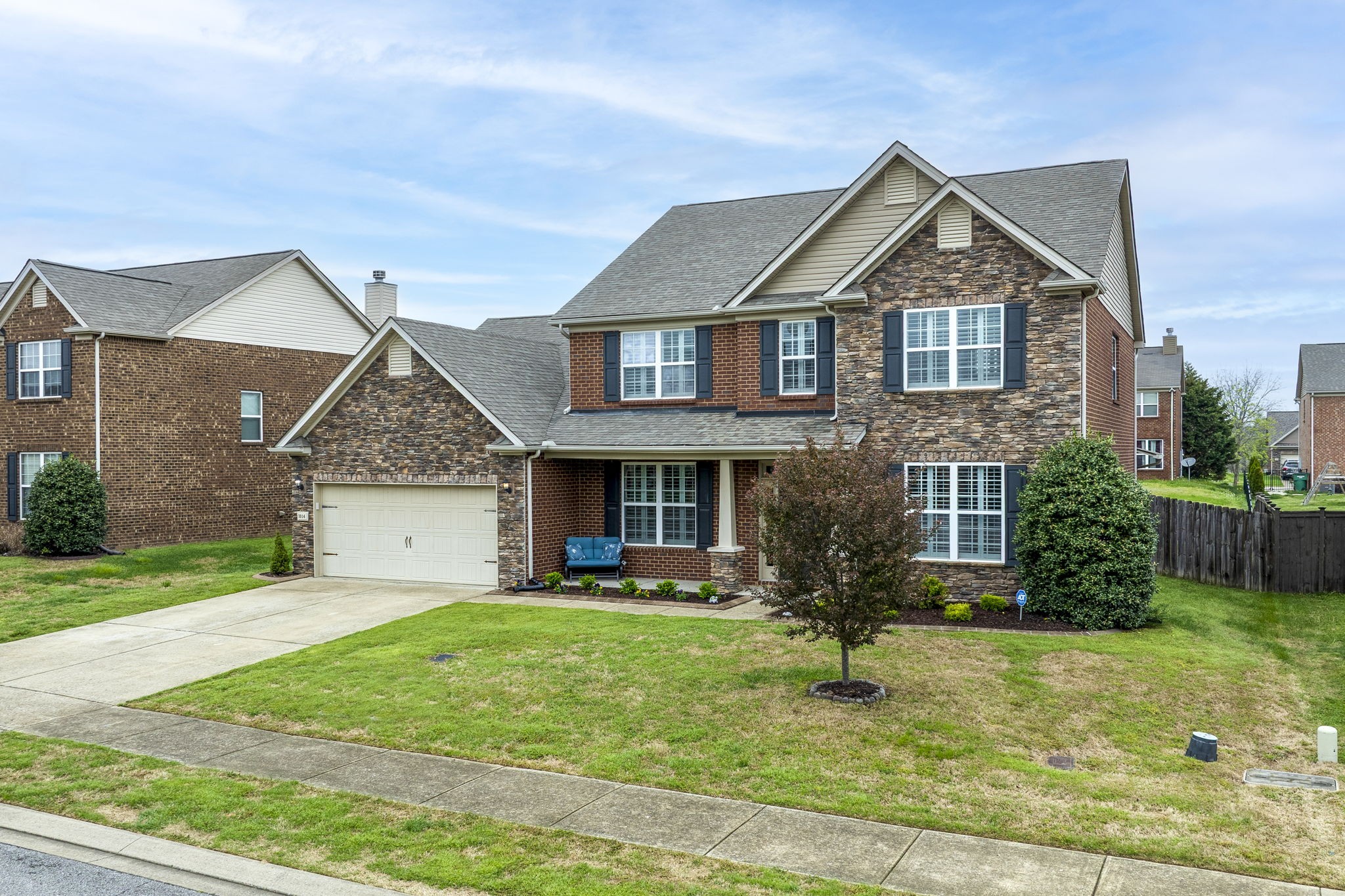 1014 Lacebark Lane Hendersonville, TN 37075 - Photo 3 of 69 a front view of a house with garden