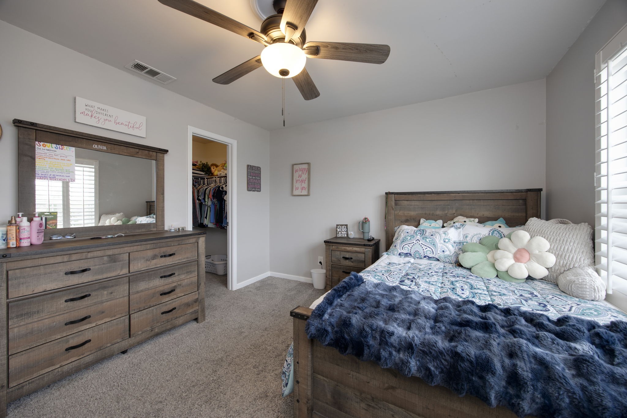 1014 Lacebark Lane Hendersonville, TN 37075 - Photo 40 of 69 a bedroom with a large bed and a chandelier