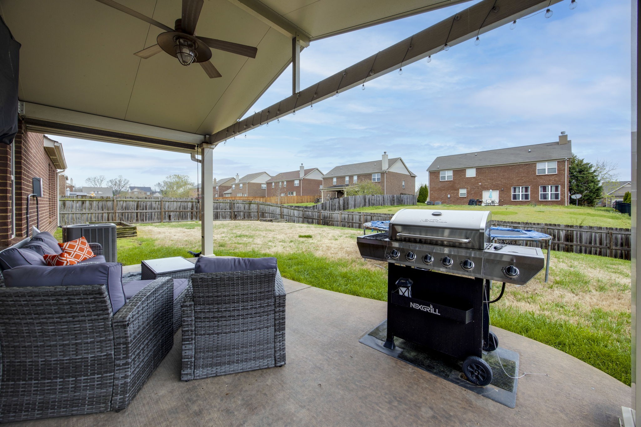 1014 Lacebark Lane Hendersonville, TN 37075 - Photo 50 of 69 a living room with furniture and a floor to ceiling window