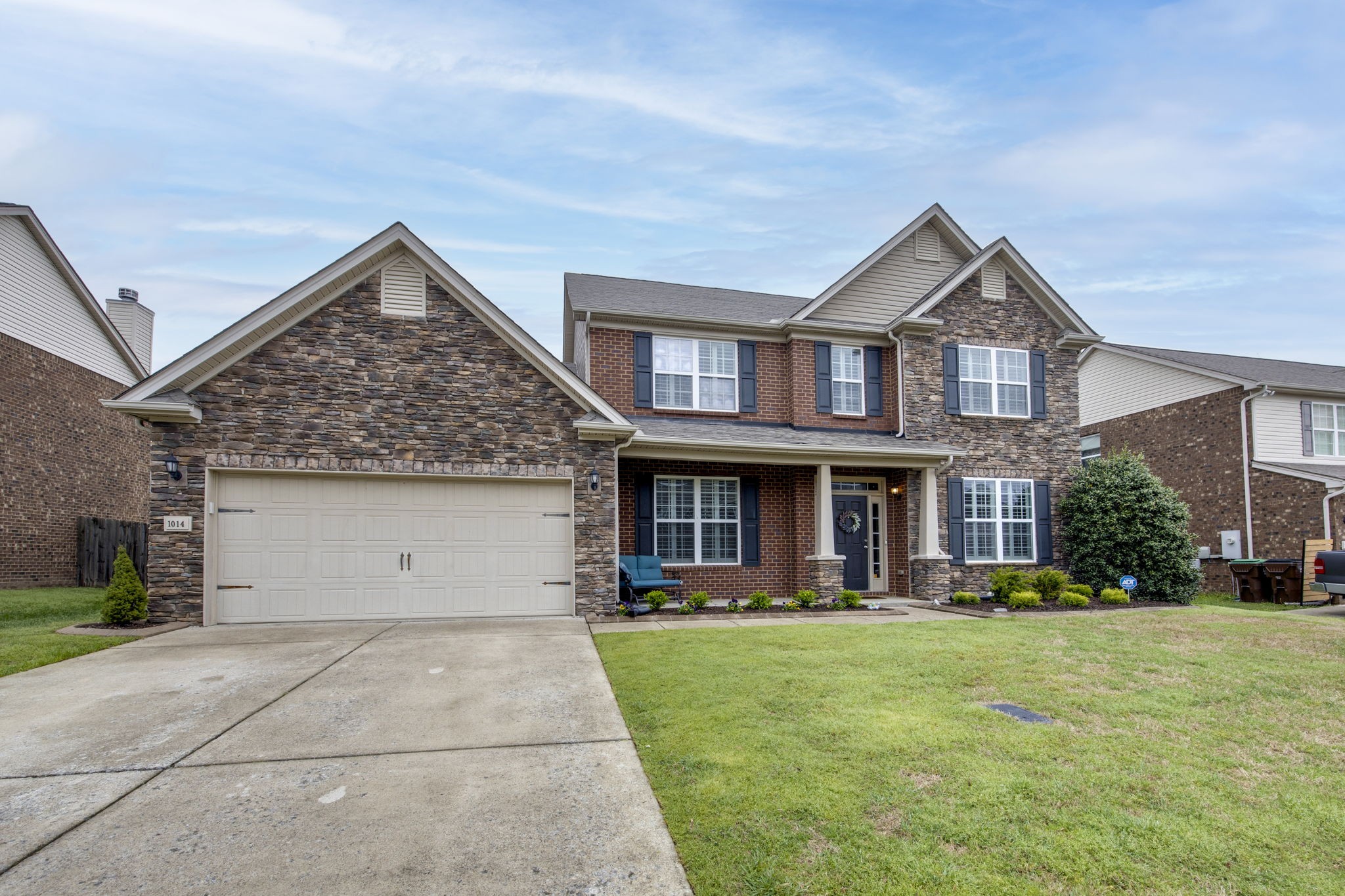 1014 Lacebark Lane Hendersonville, TN 37075 - Photo 5 of 69 a front view of a house with a yard and trees