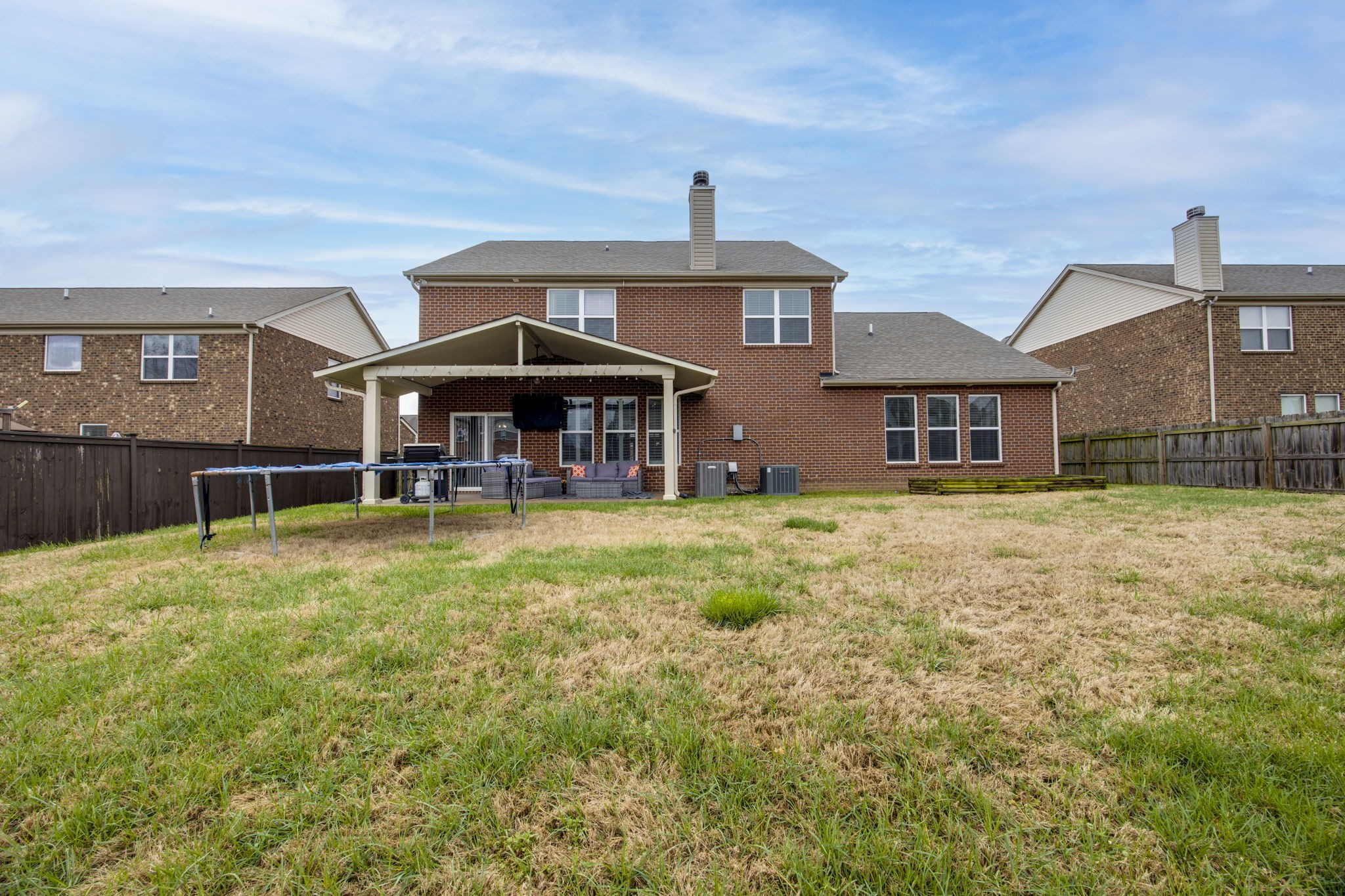 1014 Lacebark Lane Hendersonville, TN 37075 - Photo 52 of 69 a front view of a house with yard porch and furniture