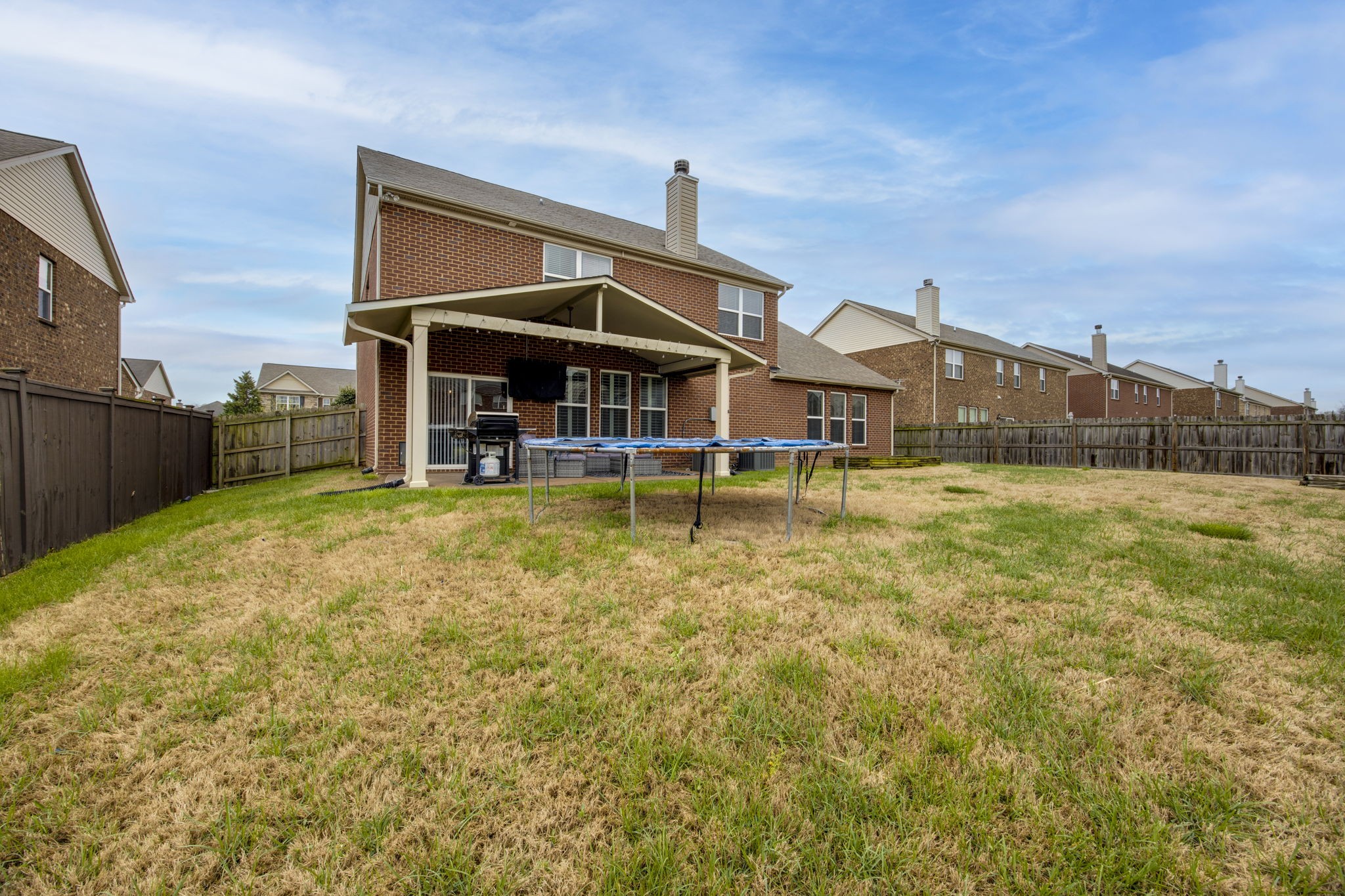 1014 Lacebark Lane Hendersonville, TN 37075 - Photo 53 of 69 a view of a house with a yard patio and dining space