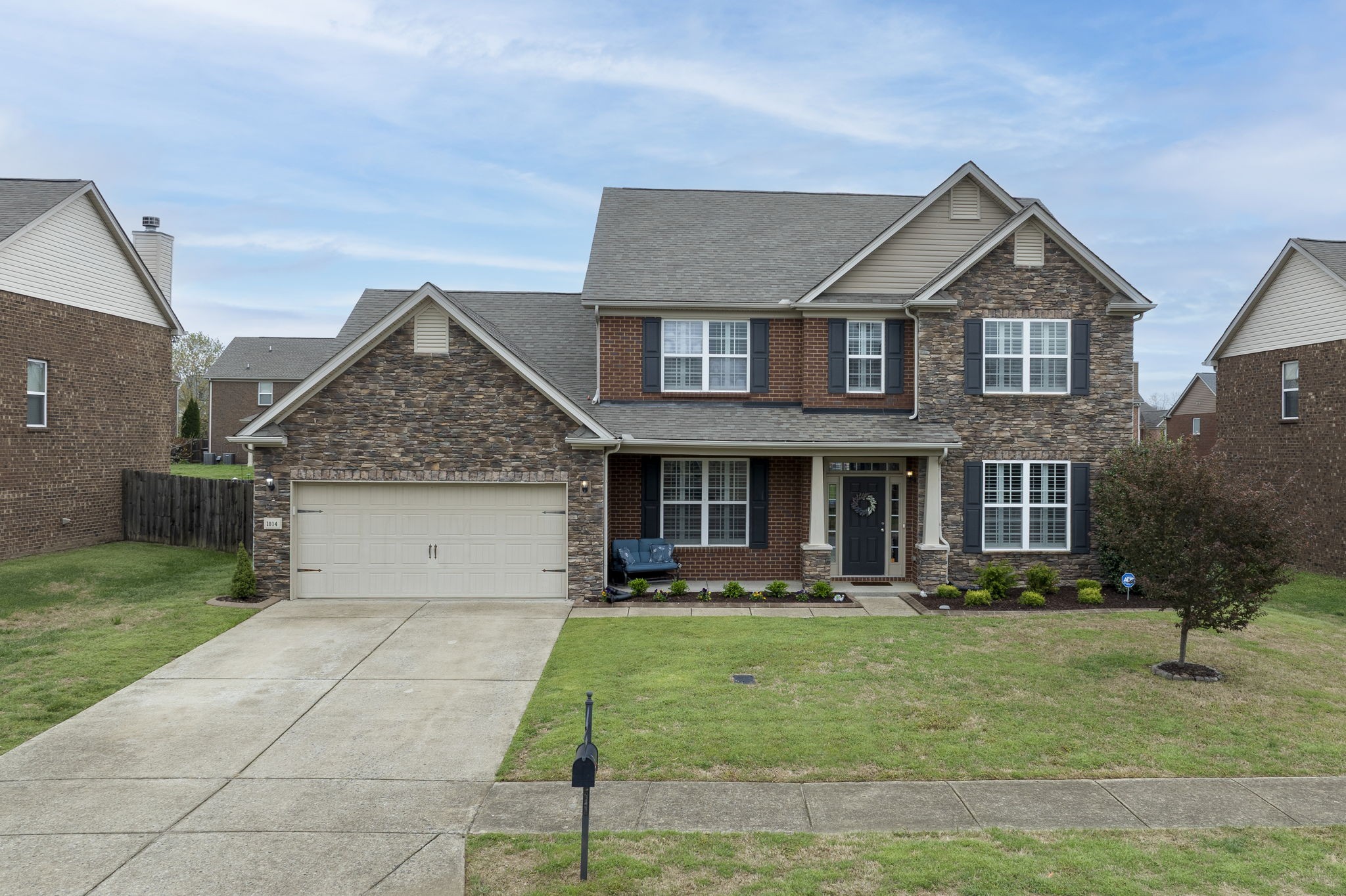 1014 Lacebark Lane Hendersonville, TN 37075 - Photo 6 of 69 a front view of a house with a yard