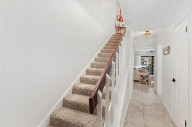 a bathroom with a toilet a sink and a mirror
