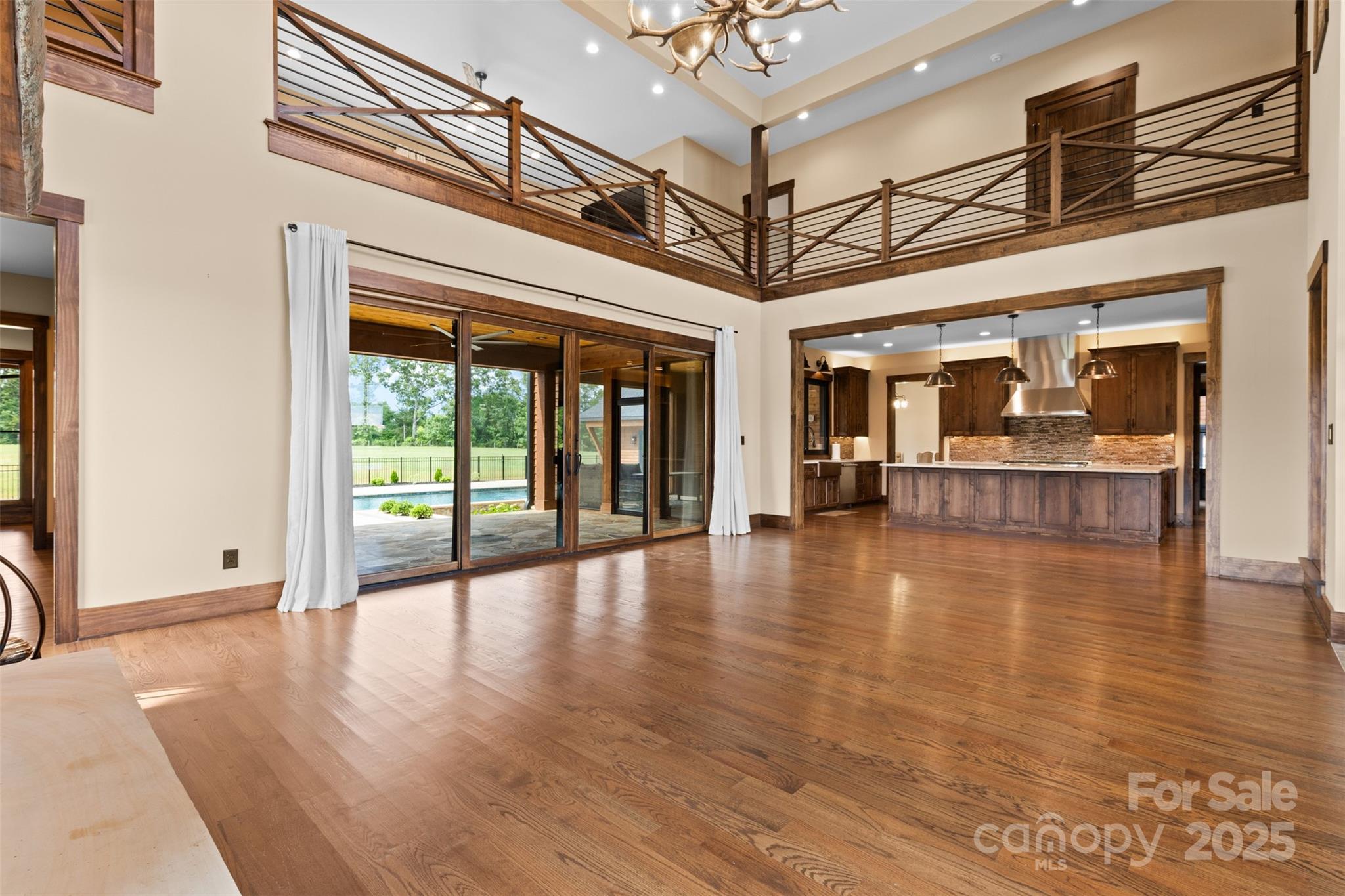 1822 Irby Road Monroe, NC 28112 - Photo 12 of 42 a view of an entryway with wooden floor and a fireplace