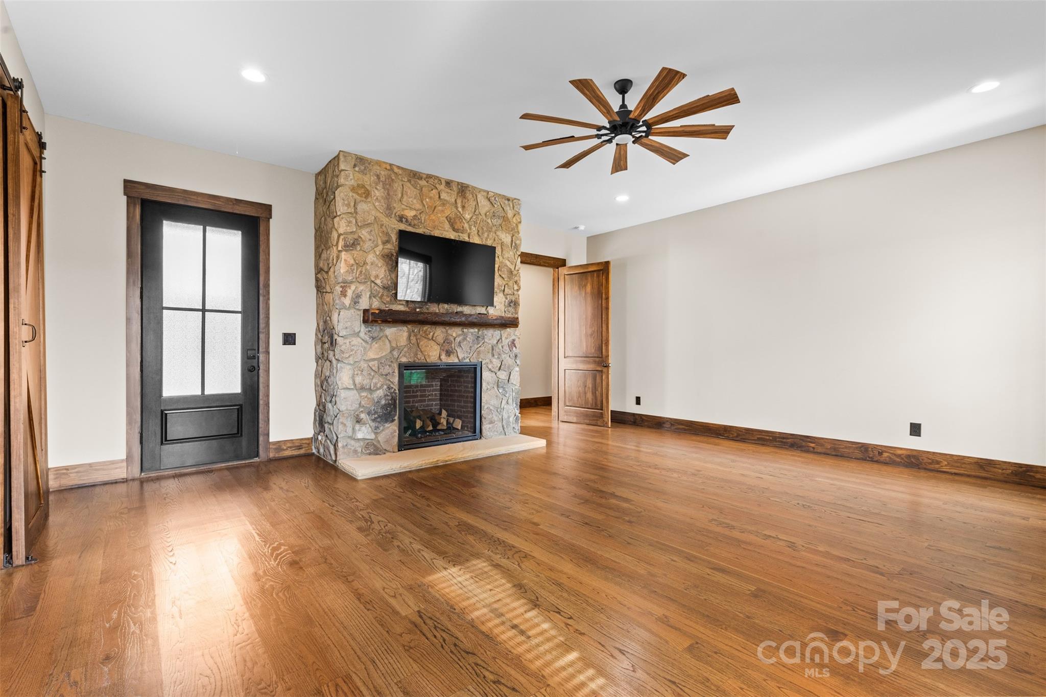1822 Irby Road Monroe, NC 28112 - Photo 20 of 42 a view of livingroom with hardwood floor and a ceiling fan