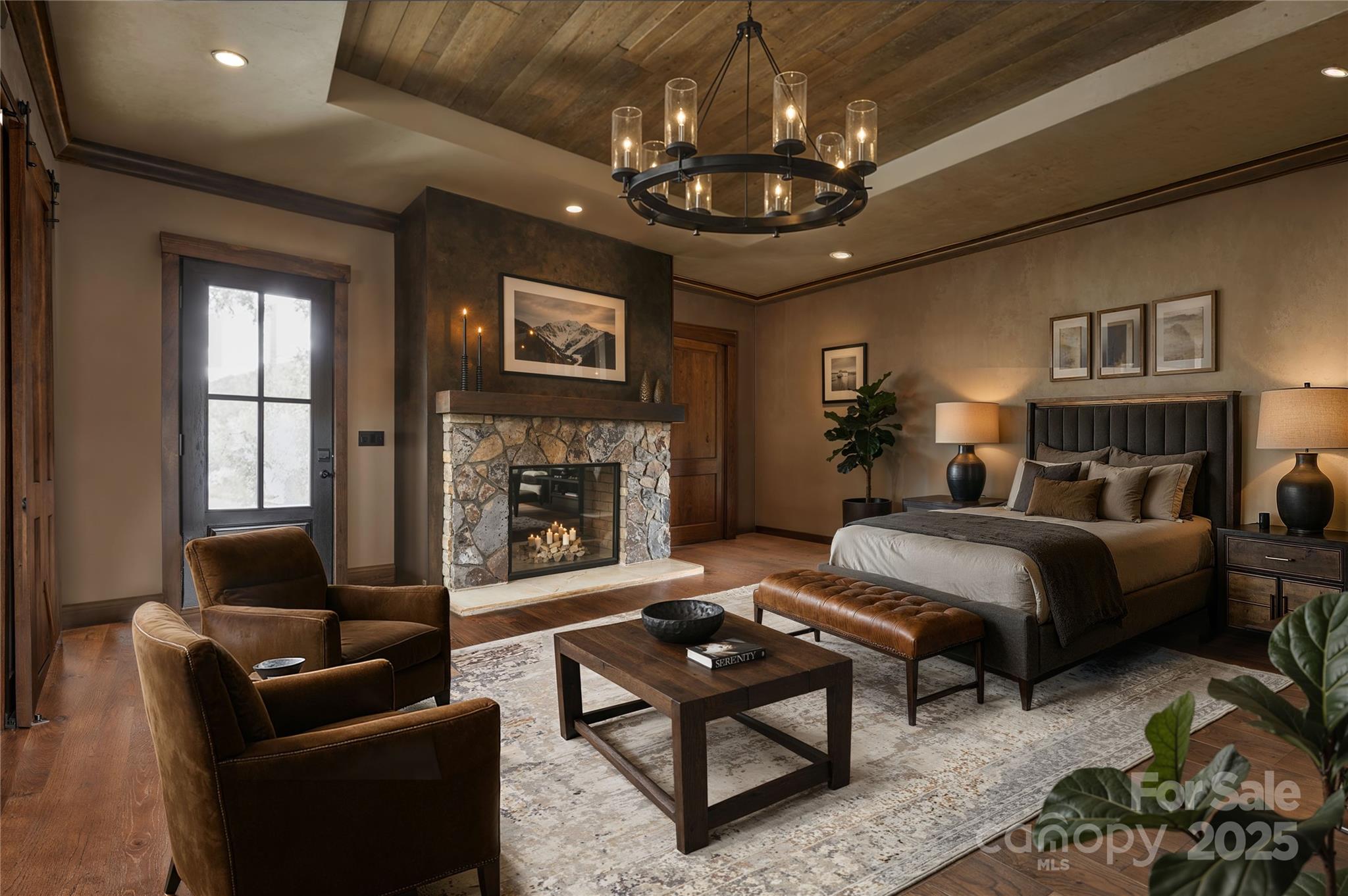 1822 Irby Road Monroe, NC 28112 - Photo 21 of 42 a living room with furniture a chandelier and a fireplace
