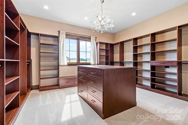 a kitchen with a cabinets and window