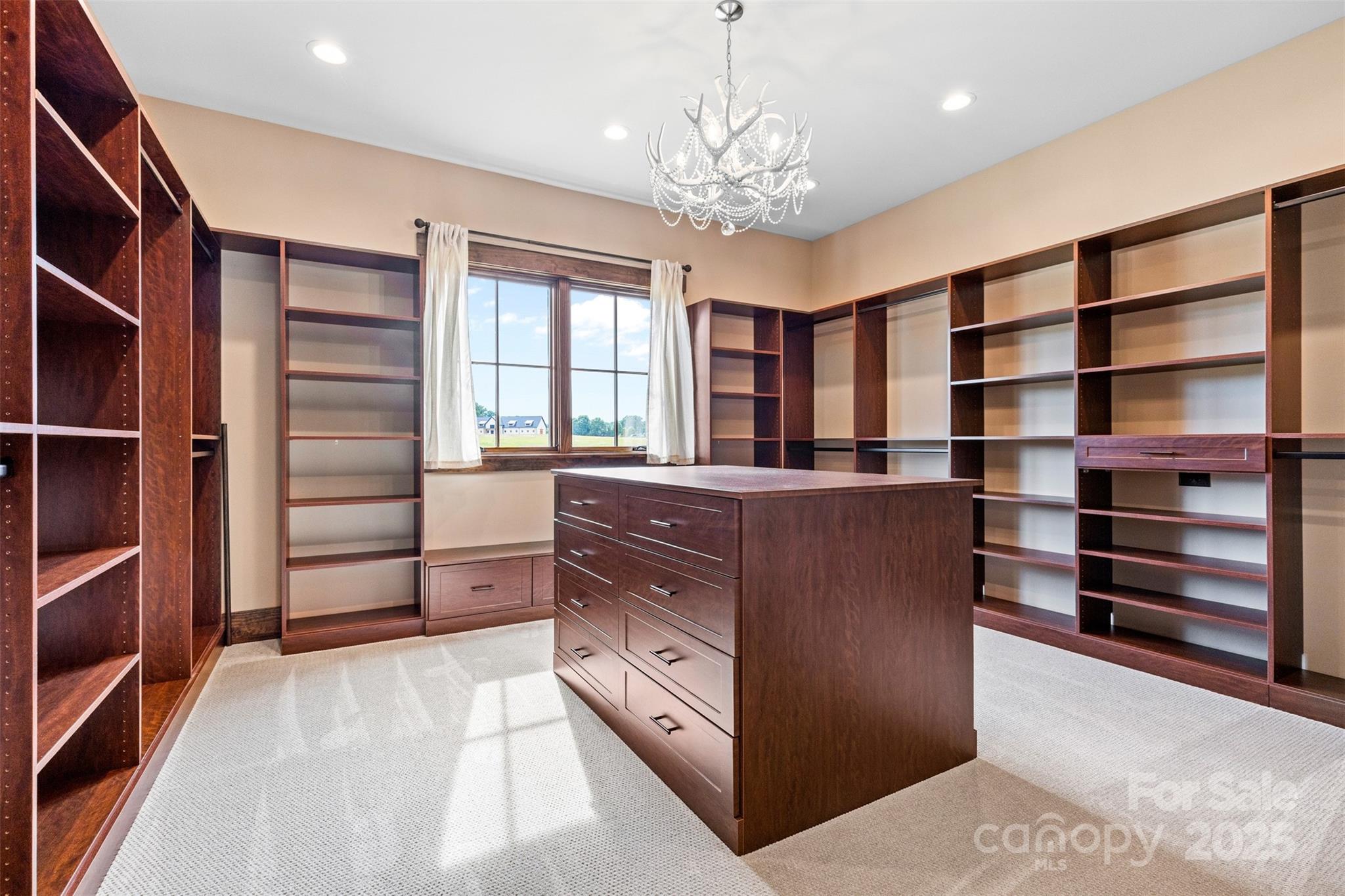 1822 Irby Road Monroe, NC 28112 - Photo 22 of 42 a kitchen with a cabinets and window
