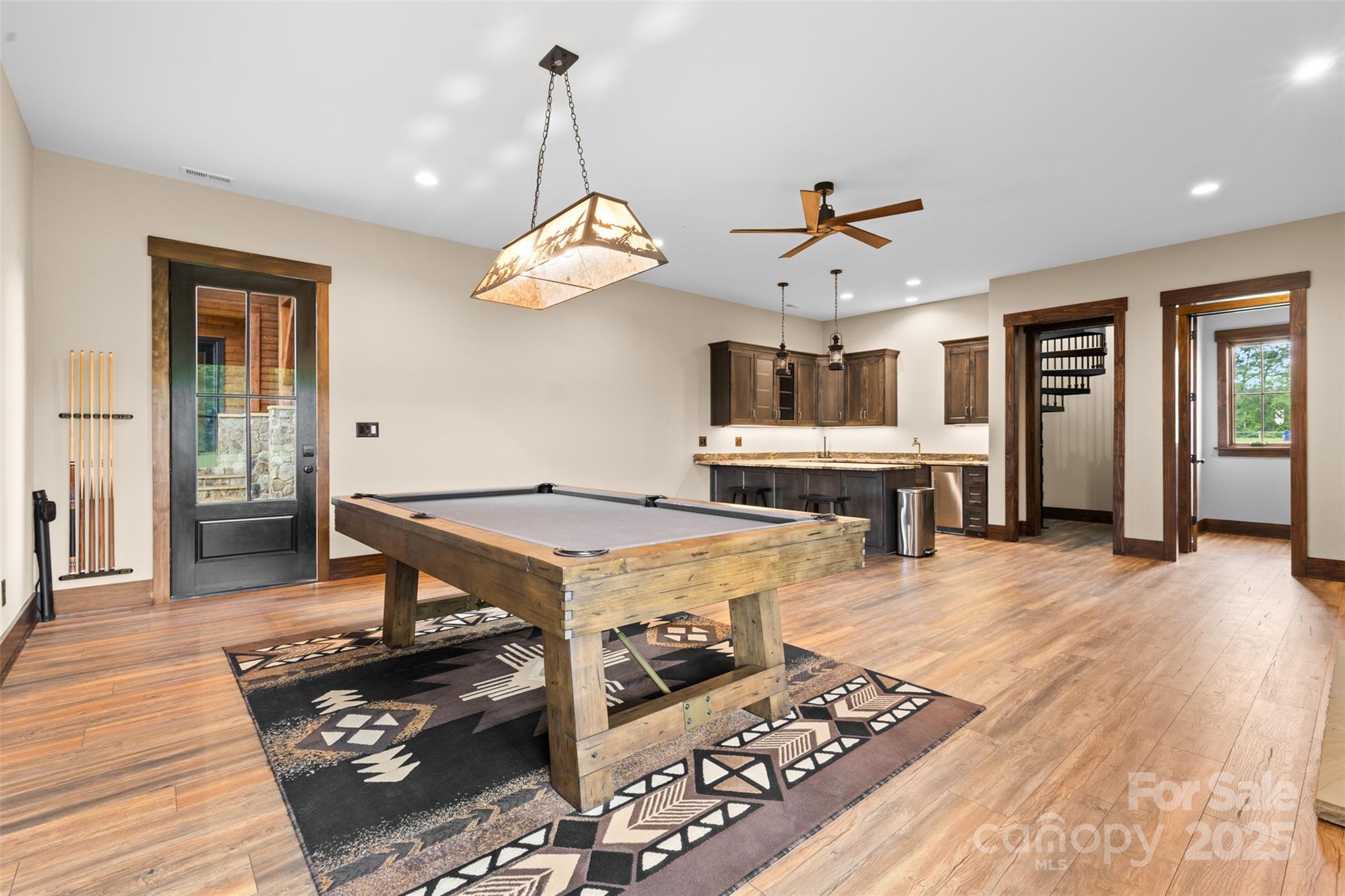 1822 Irby Road Monroe, NC 28112 - Photo 30 of 42 a living room with fireplace furniture and a wooden floor