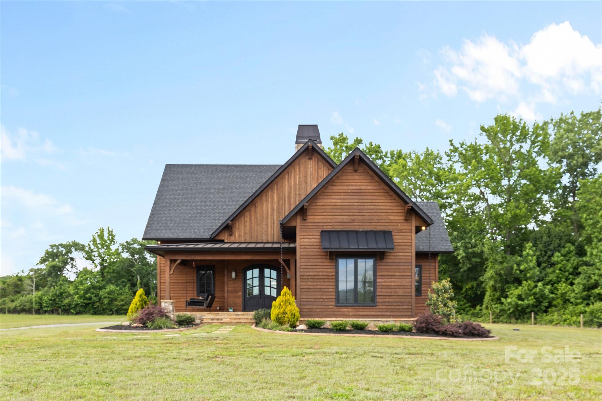 1822 Irby Road Monroe, NC 28112 - Photo 32 of 42 a front view of a house with garden