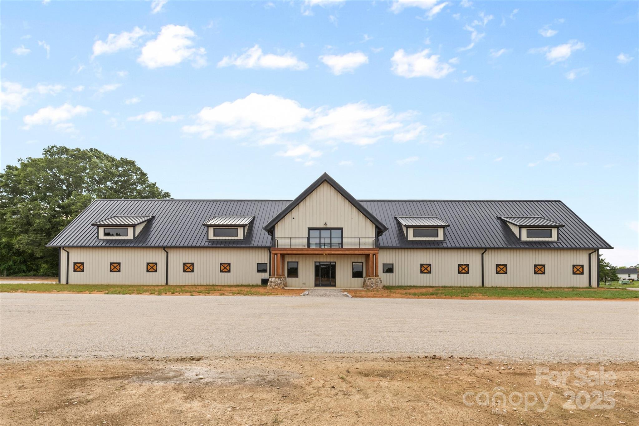 1822 Irby Road Monroe, NC 28112 - Photo 36 of 42 a front view of a house with large windows