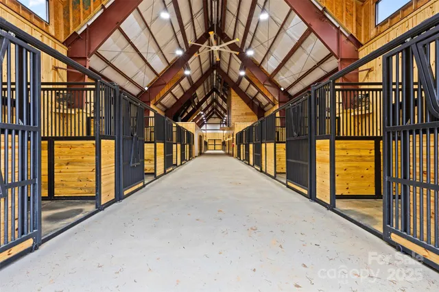 a view of swimming pool with large windows
