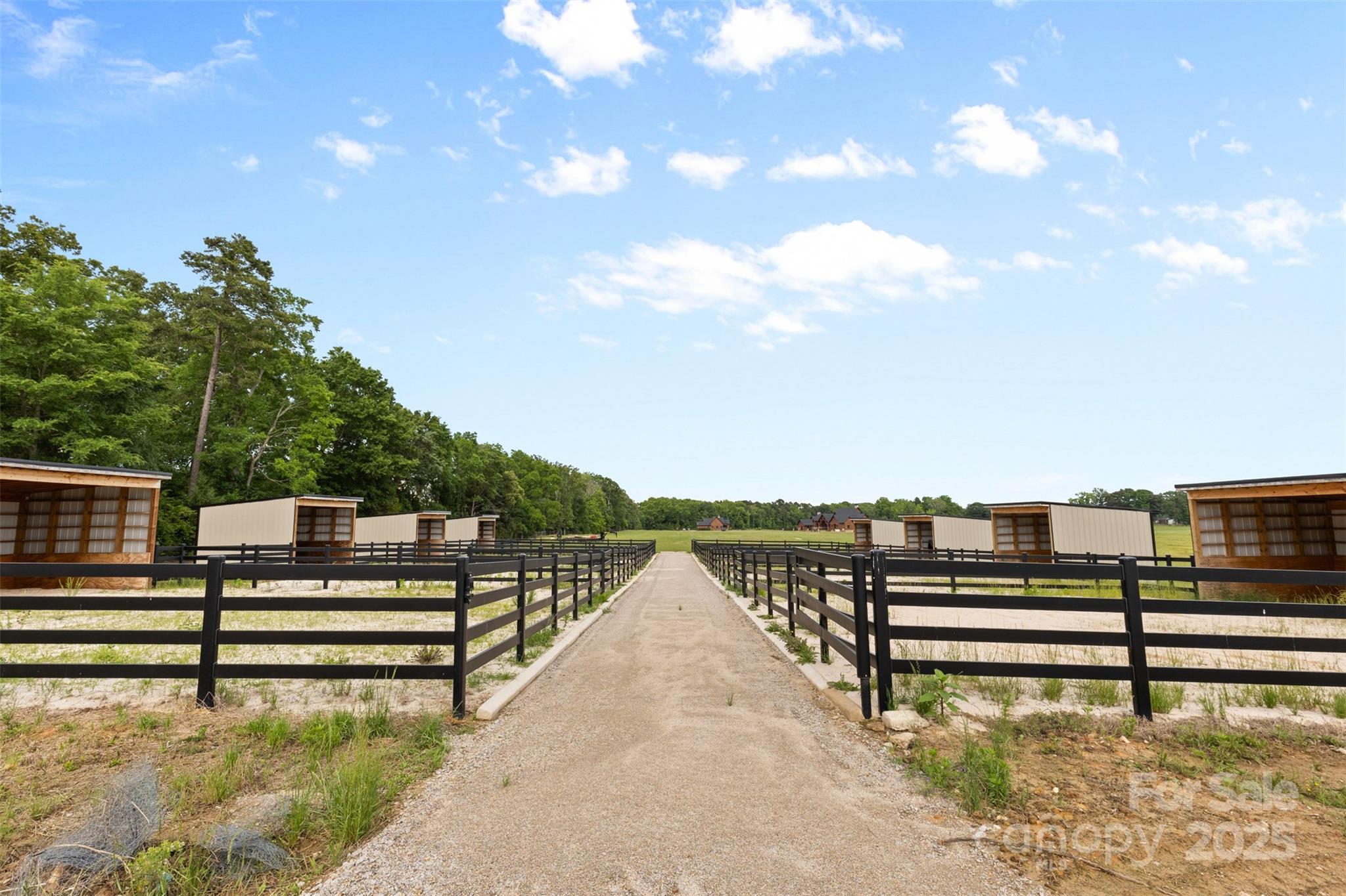 1822 Irby Road Monroe, NC 28112 - Photo 41 of 42 a view of a swimming pool with wooden floor and a lake view
