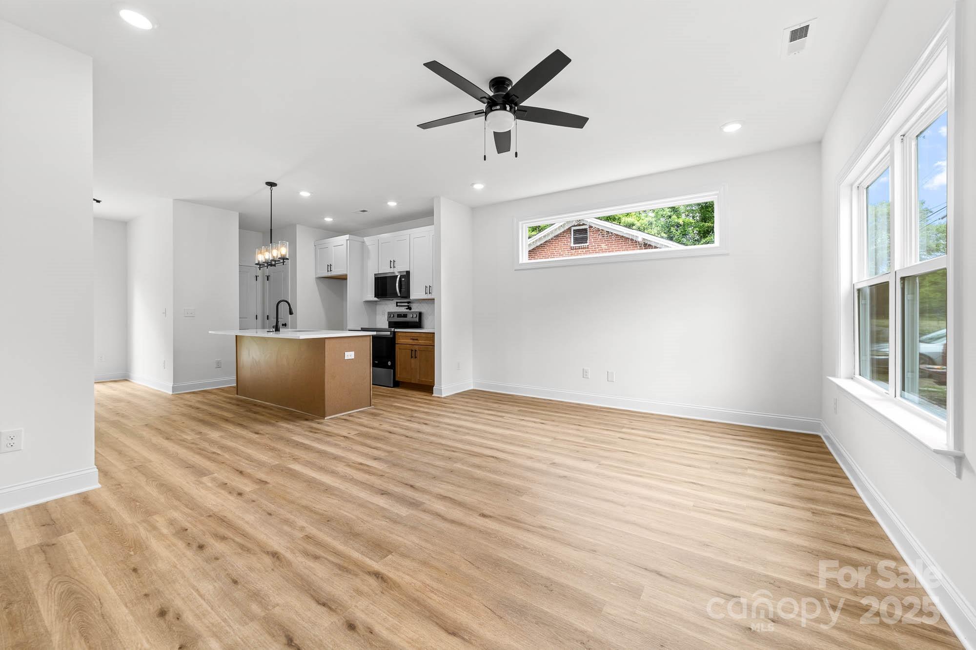 424 Airline Extension Shelby, NC 28150 - Photo 12 of 35 a view of a kitchen with a sink and a window