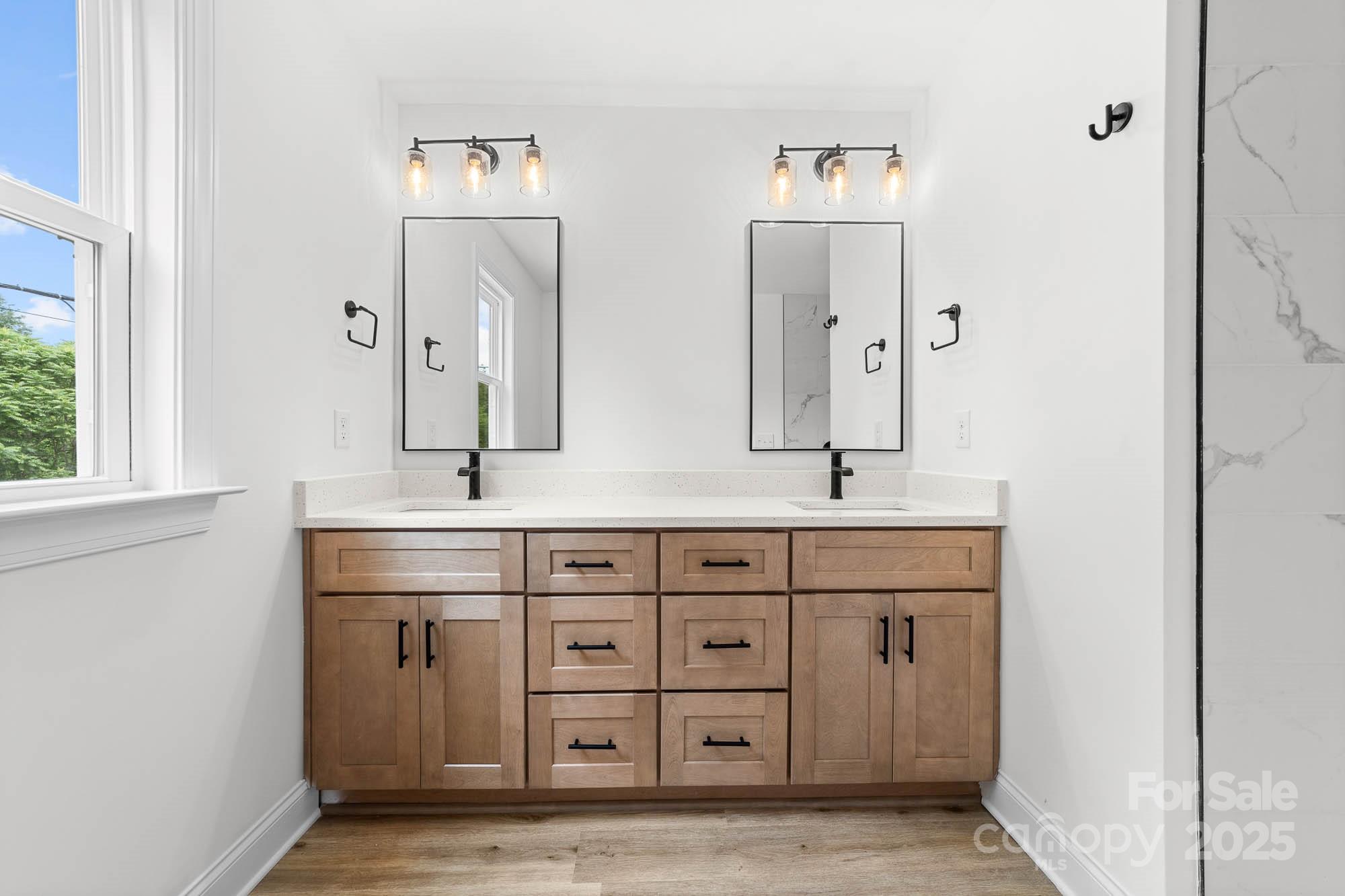 424 Airline Extension Shelby, NC 28150 - Photo 26 of 35 a spacious bathroom with a double vanity sink and a mirror