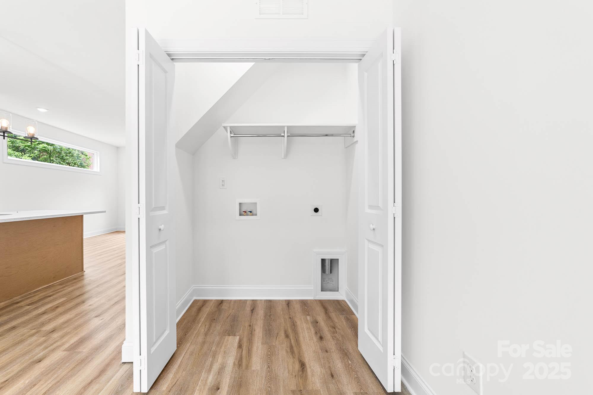 424 Airline Extension Shelby, NC 28150 - Photo 30 of 35 a view of a hallway with wooden floor and closet