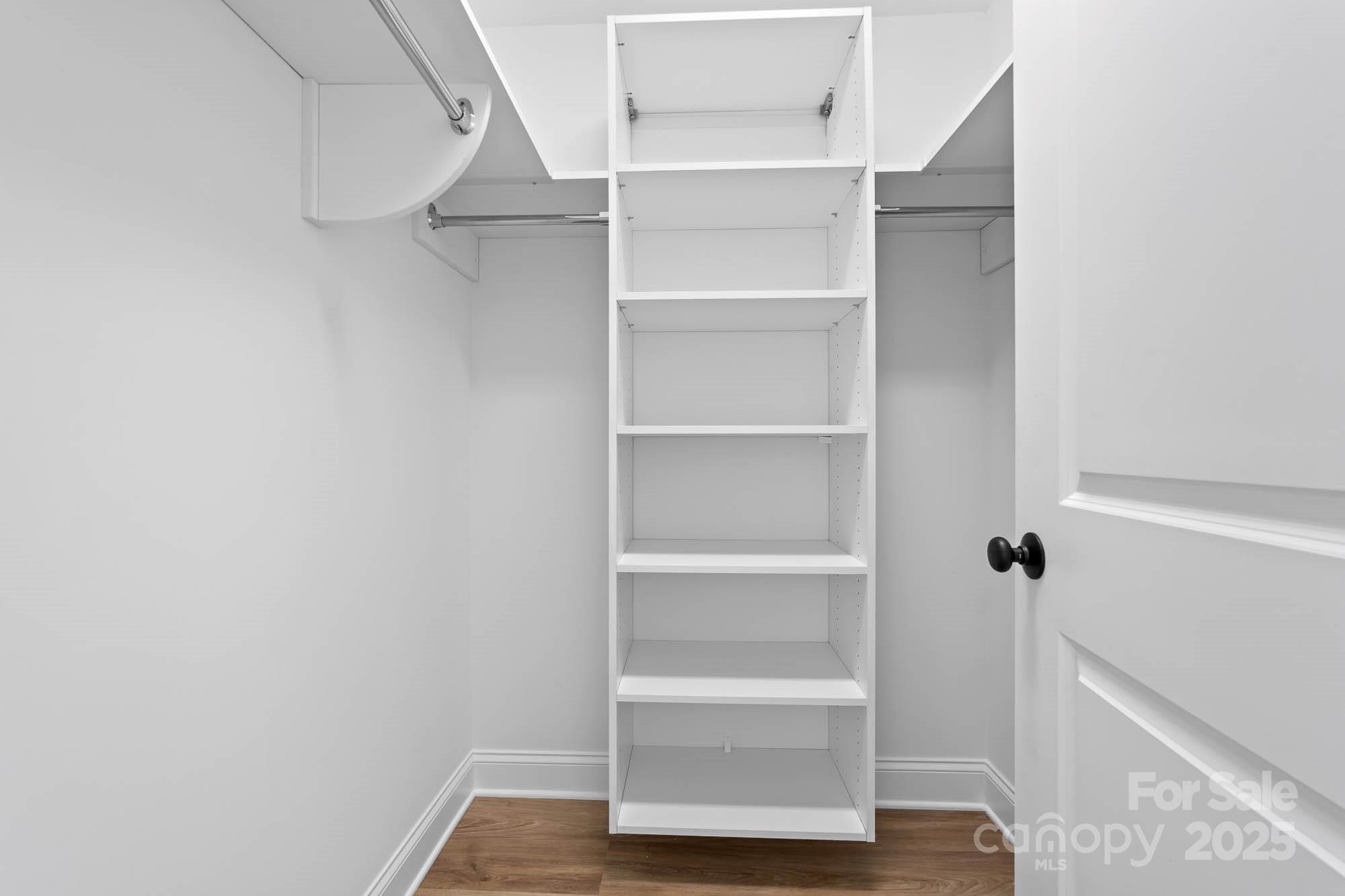 424 Airline Extension Shelby, NC 28150 - Photo 31 of 35 a view of walk in closet with empty racks