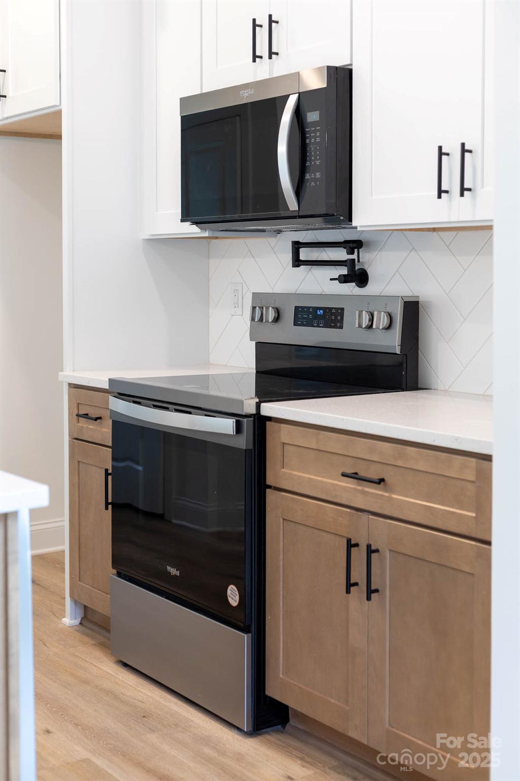 424 Airline Extension Shelby, NC 28150 - Photo 9 of 35 a kitchen with a stove and a microwave