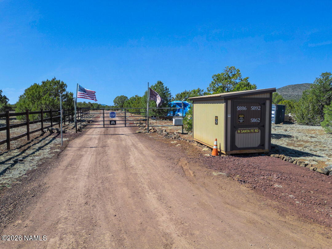 5892 North Santa Fe Road Williams, AZ 86046 - Photo 17 of 33 a view of a house with a outdoor space