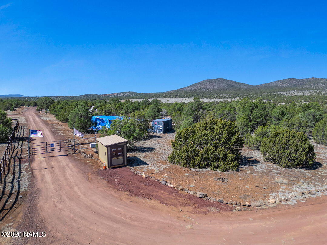 5892 North Santa Fe Road Williams, AZ 86046 - Photo 28 of 33 a view of a terrace with a garden and chair