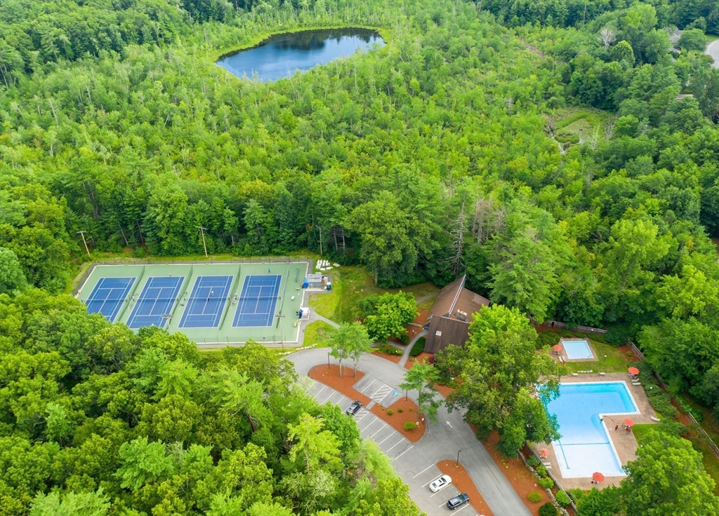 244 Old Beaverbrook, Unit 244 Acton, MA 01718 - Photo 32 of 42 an aerial view of a house