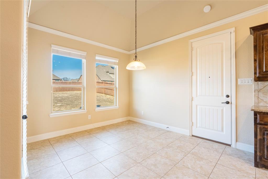 9101 Waters Lane Rowlett, TX 75089 - Photo 11 of 34 a view of an empty room with a window